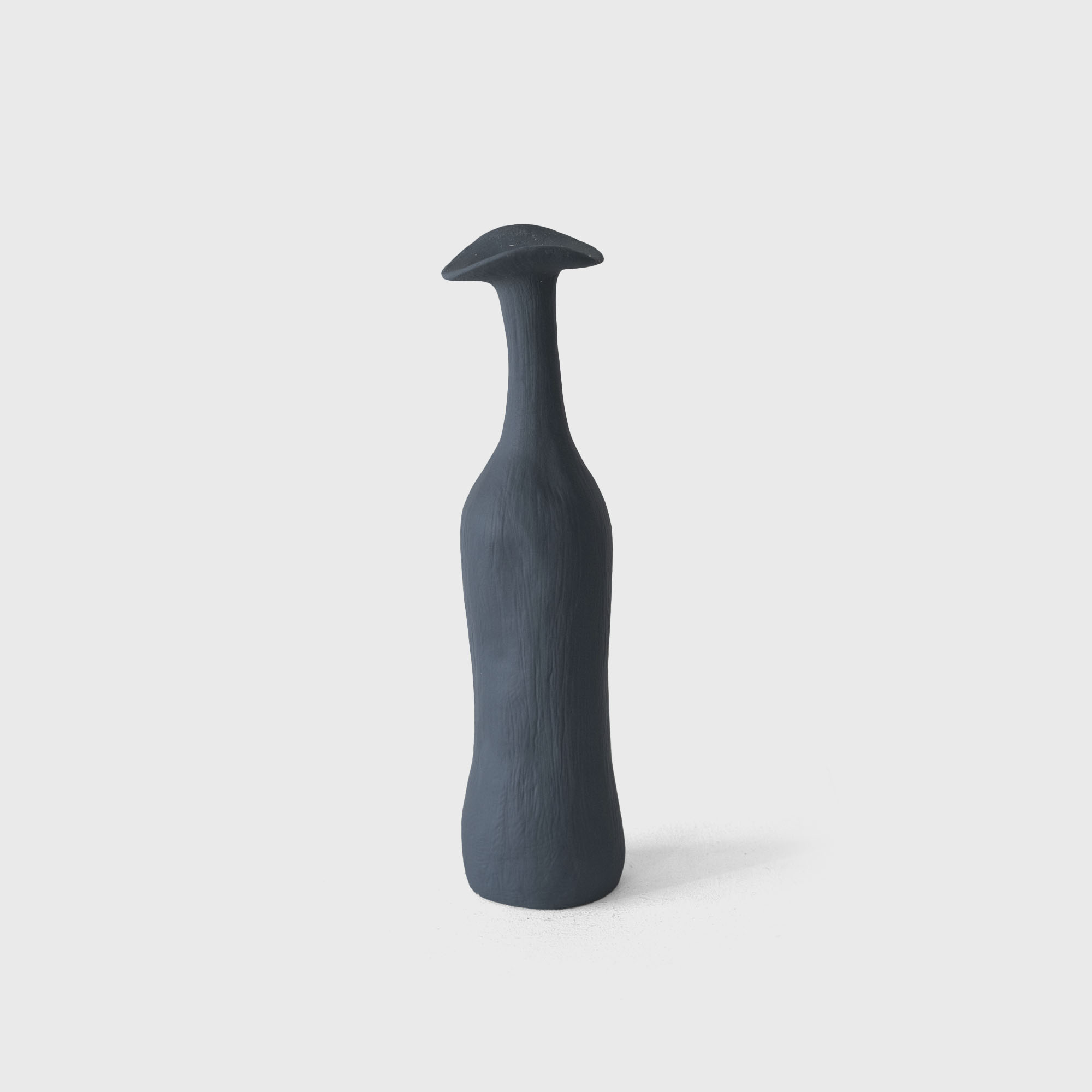 light blue ceramic flower vase