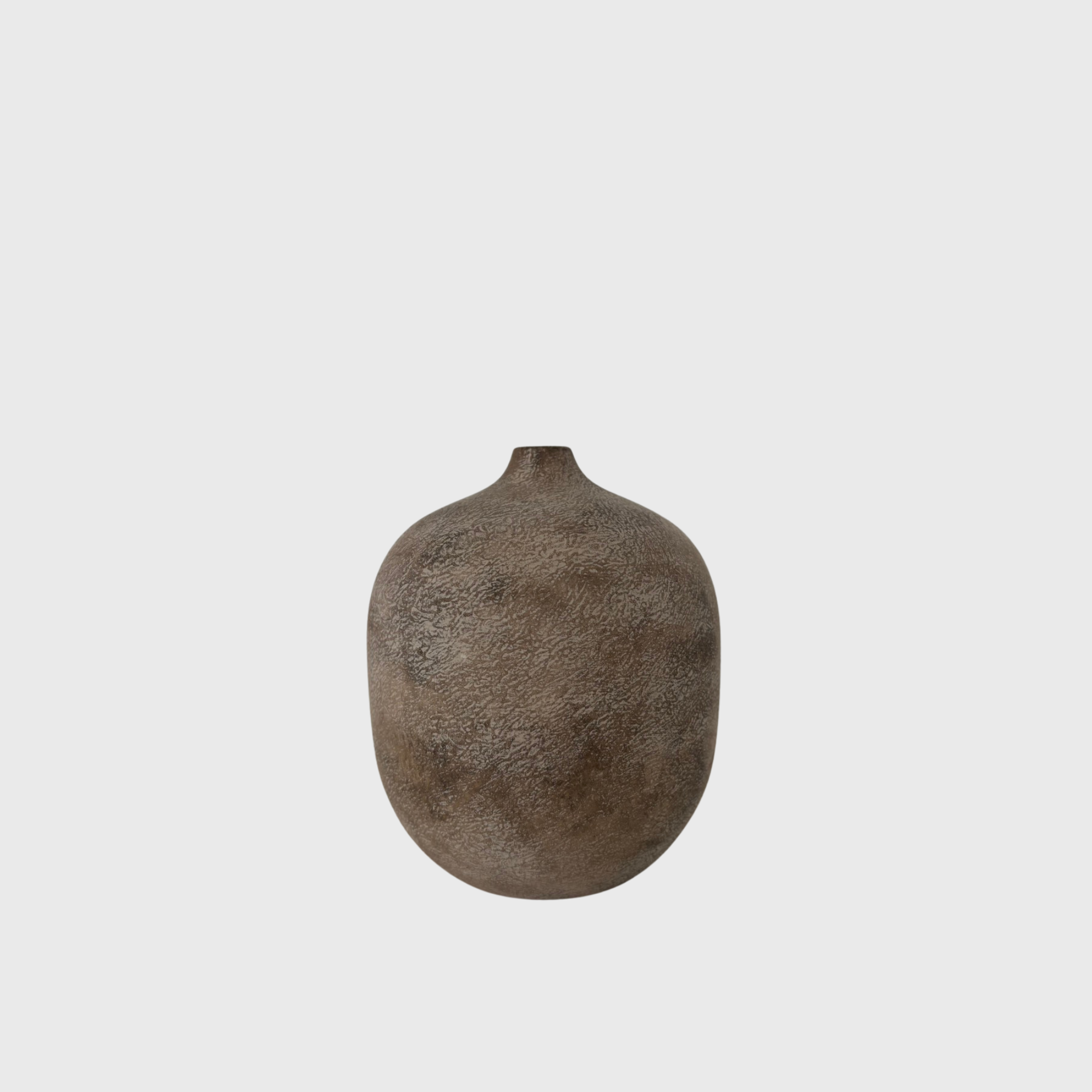 beige ceramics flower vase