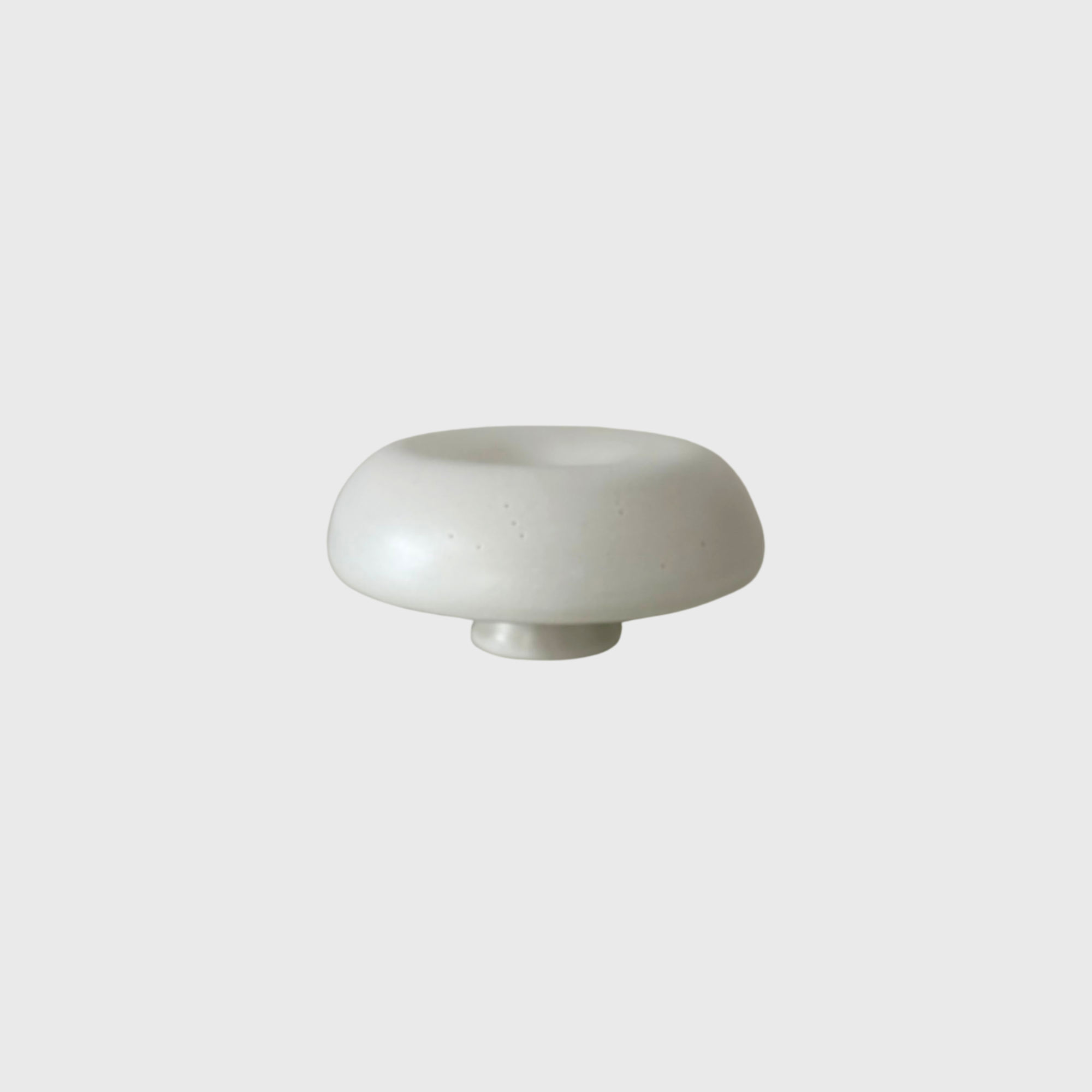 white pedestal object