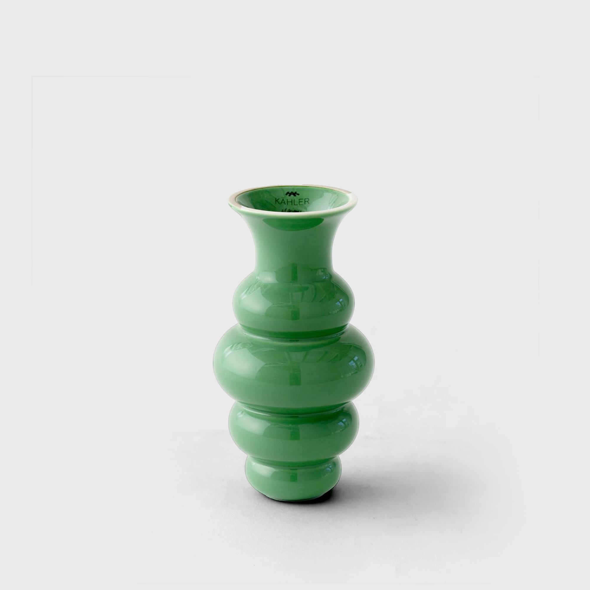 green flower vase