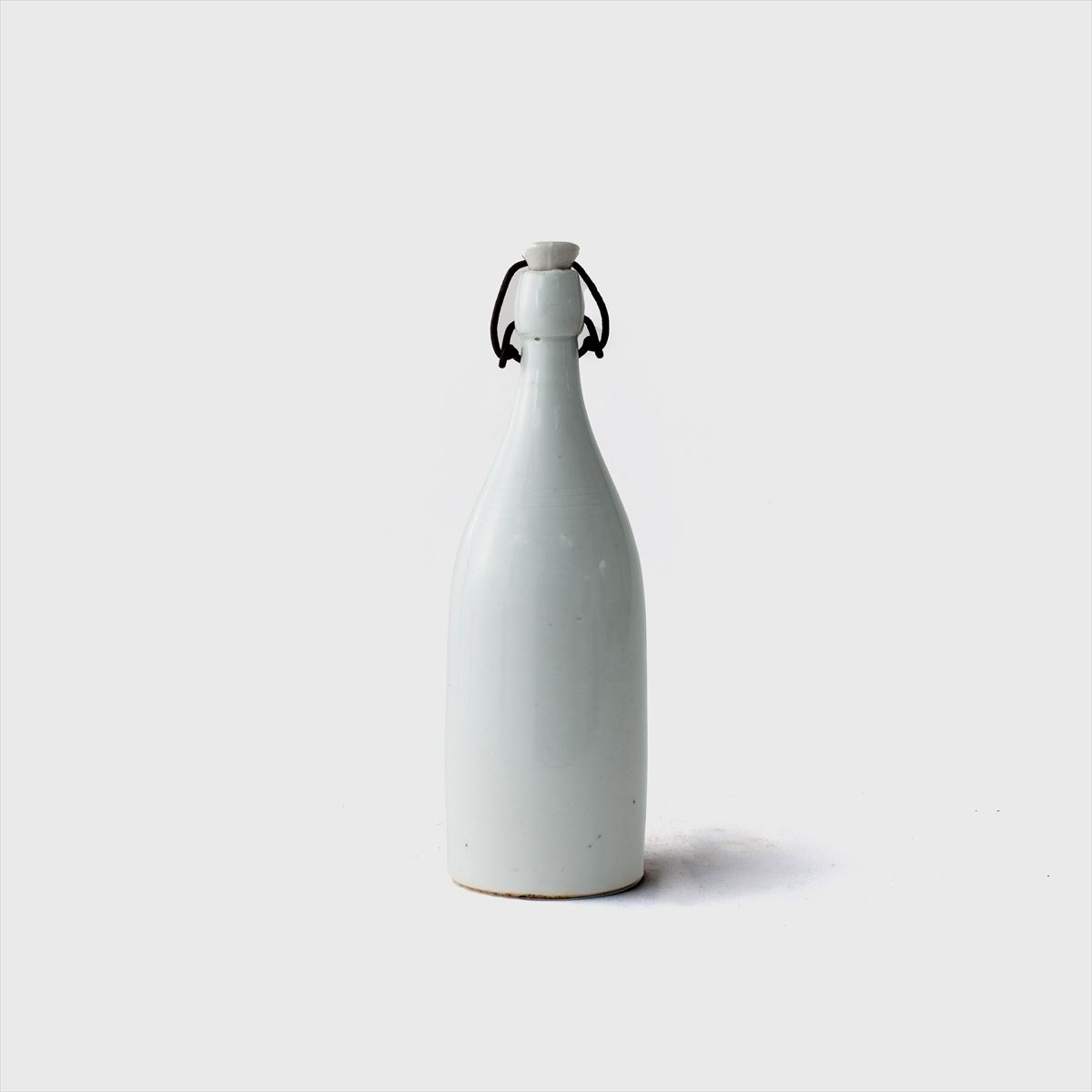 white porcelain bottle