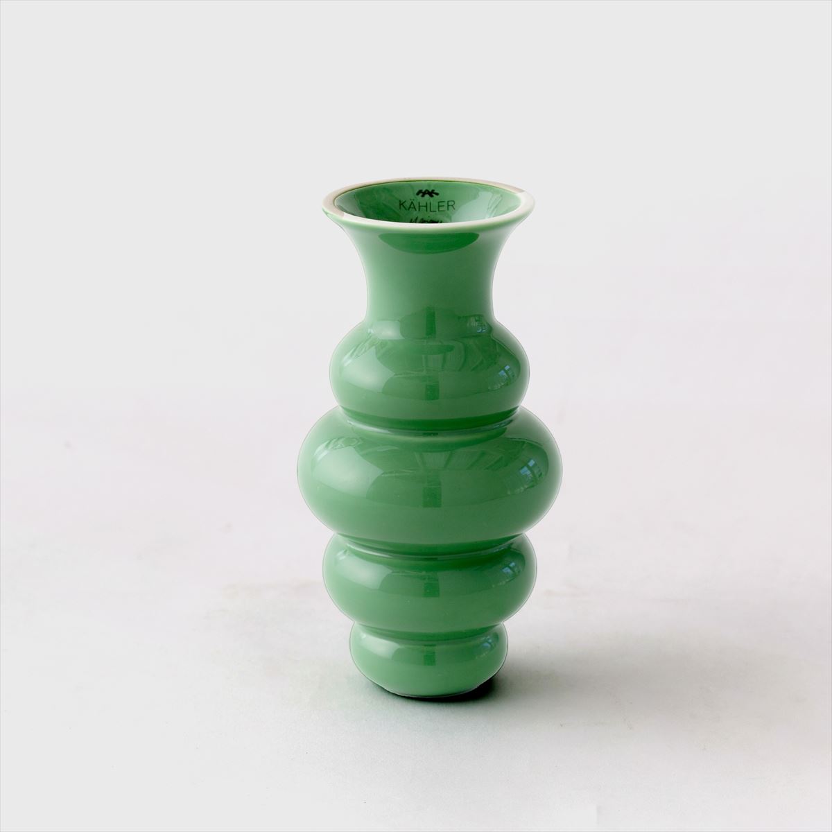 green flower vase