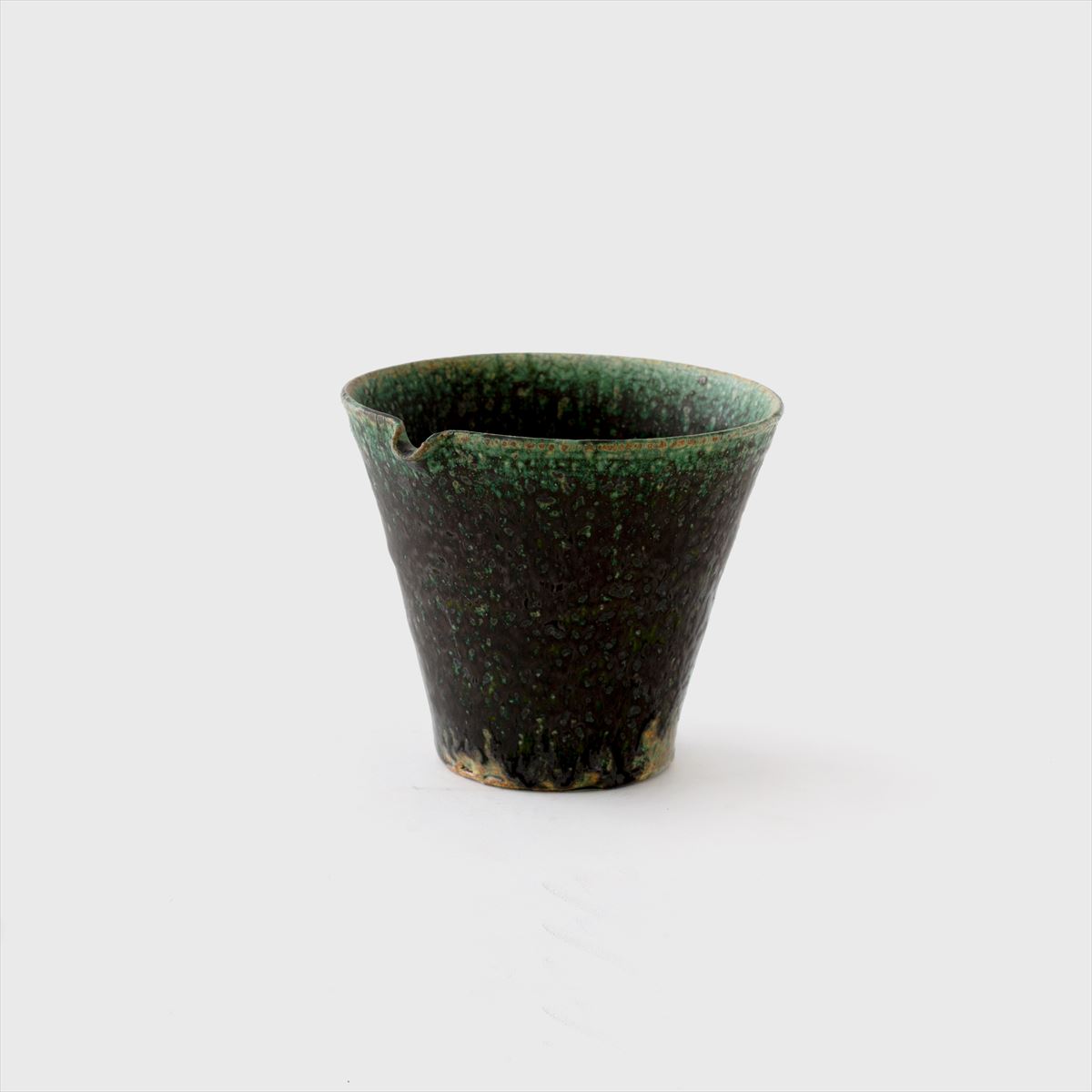 green flower vase