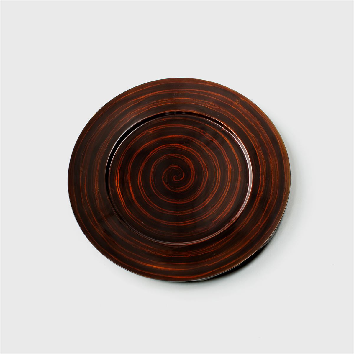 brown wood round plate