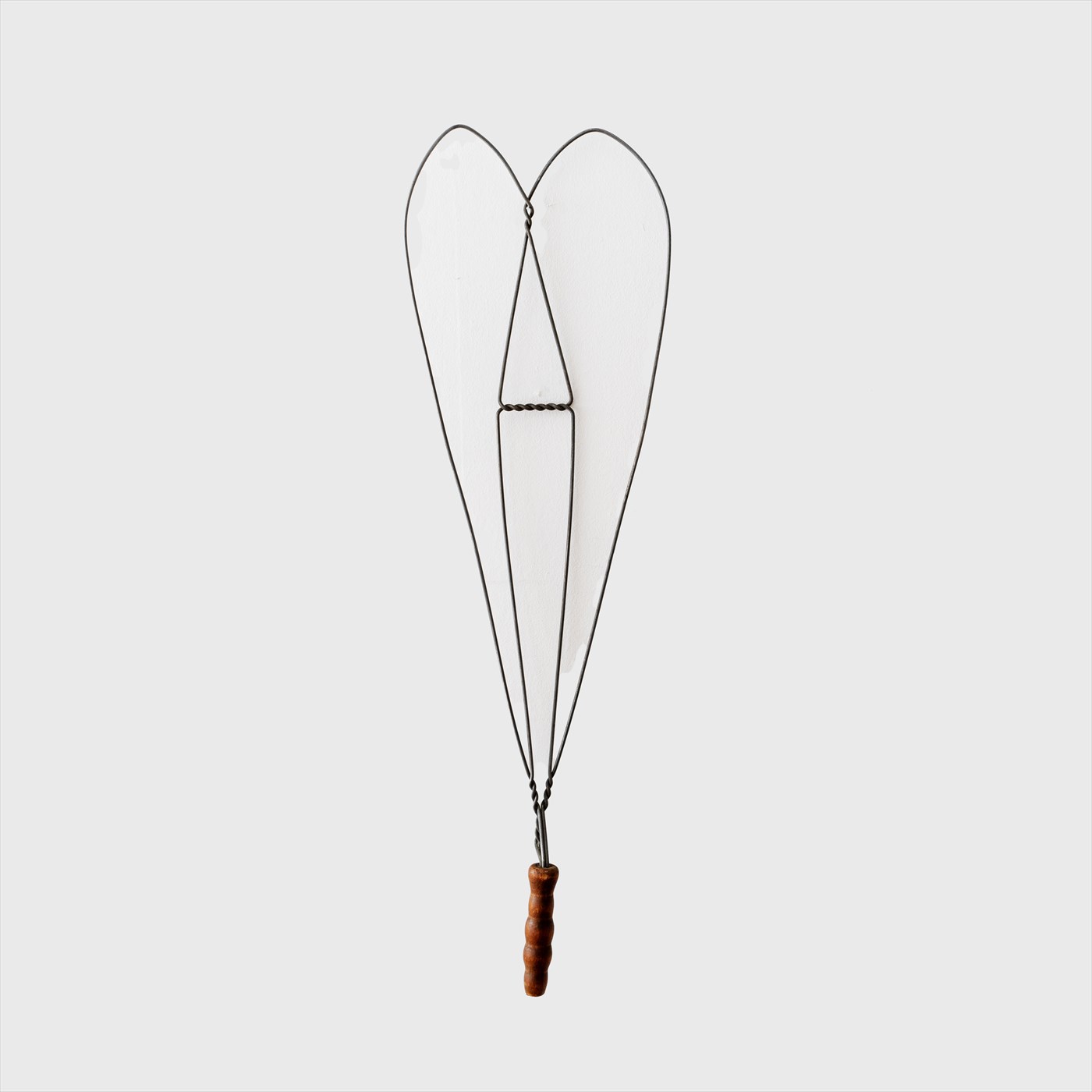 antique rug beater