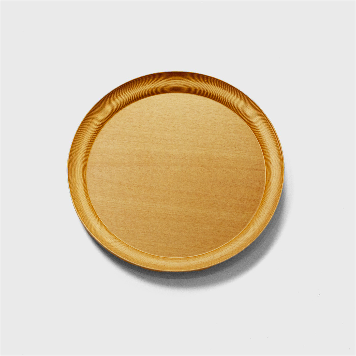 beige wood round tray