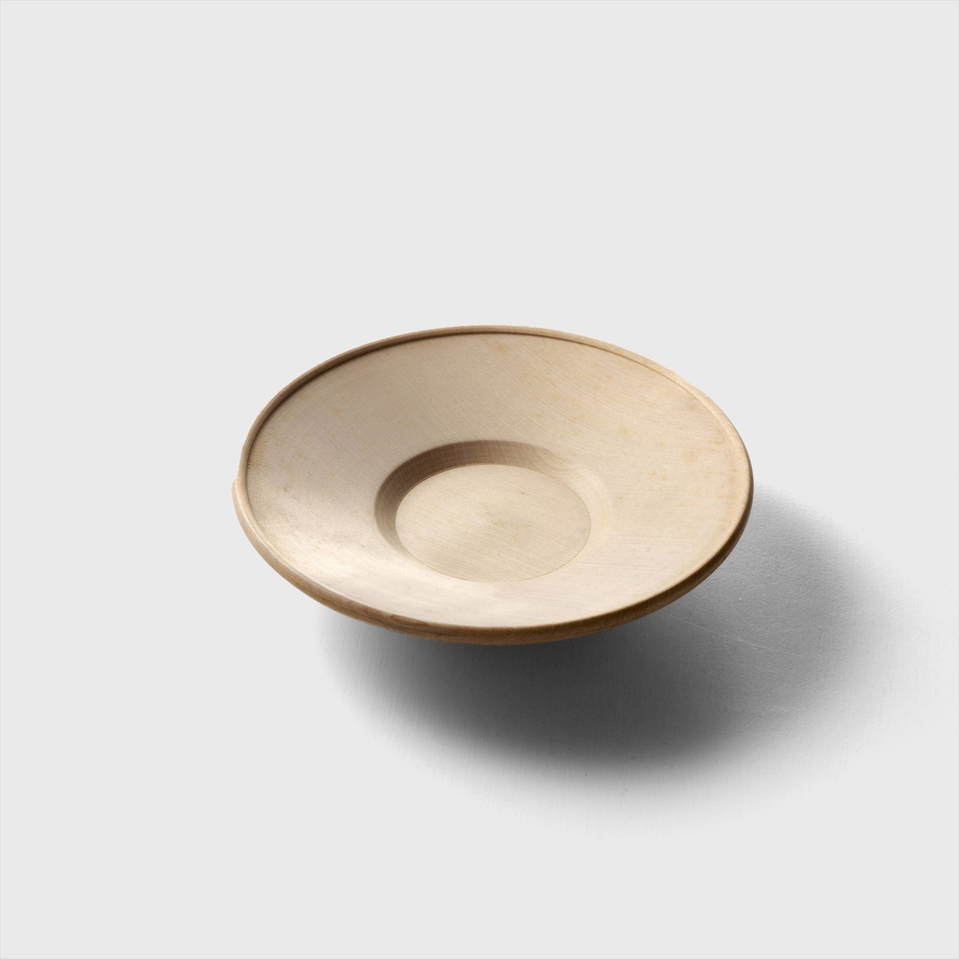 beige wood round plate