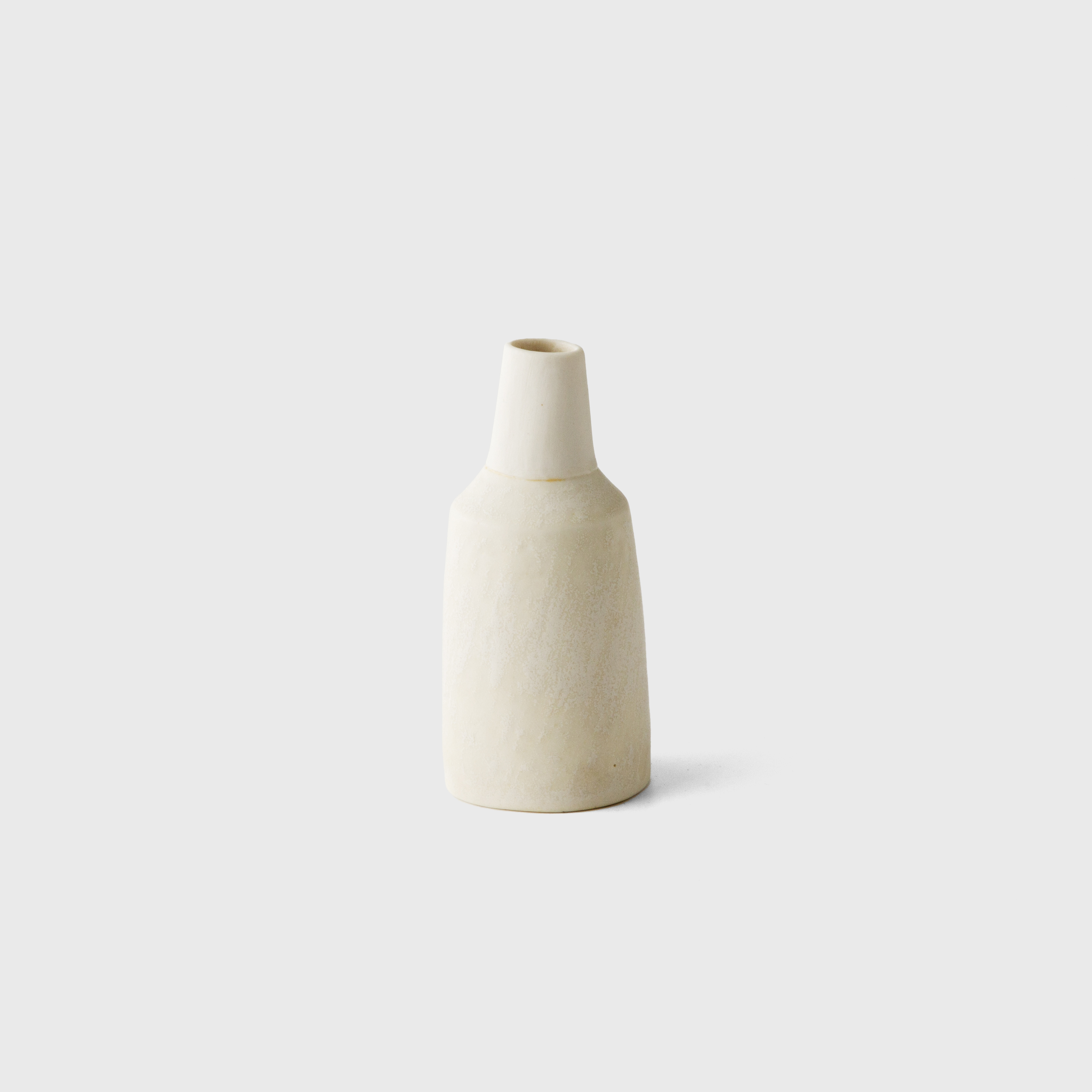 white flower vase