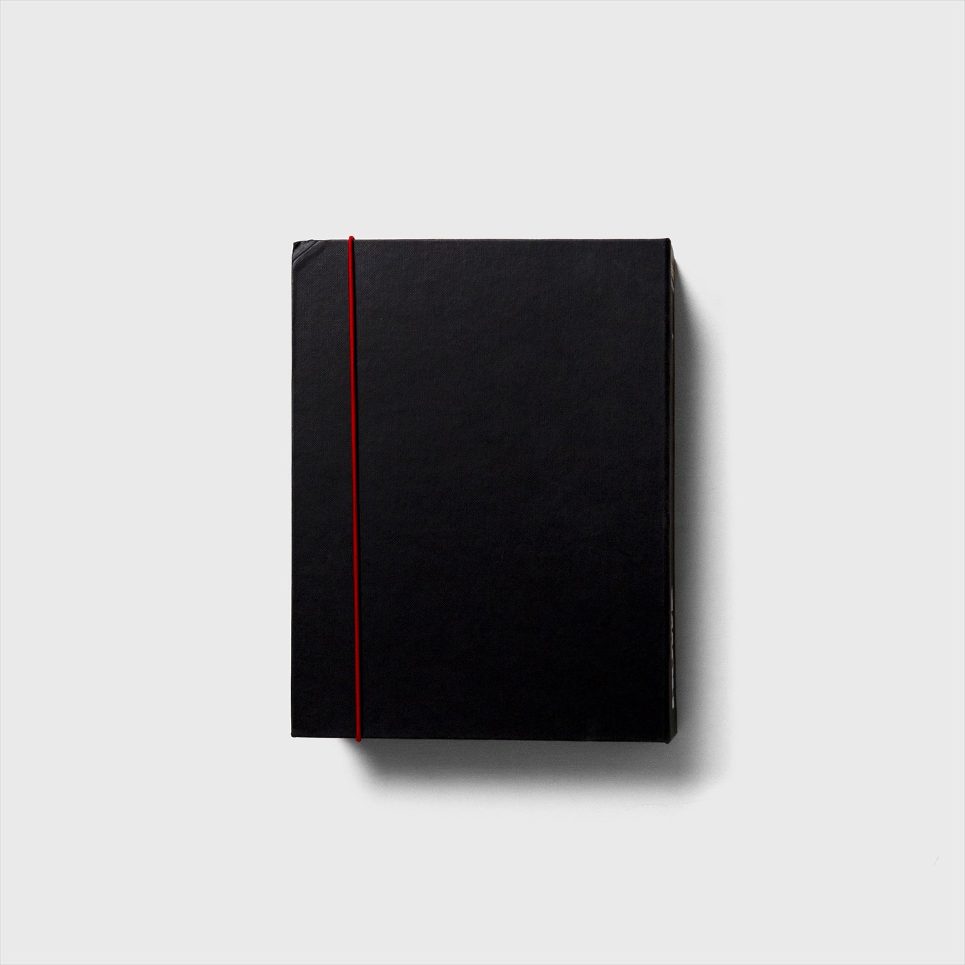 fake book
black red cord