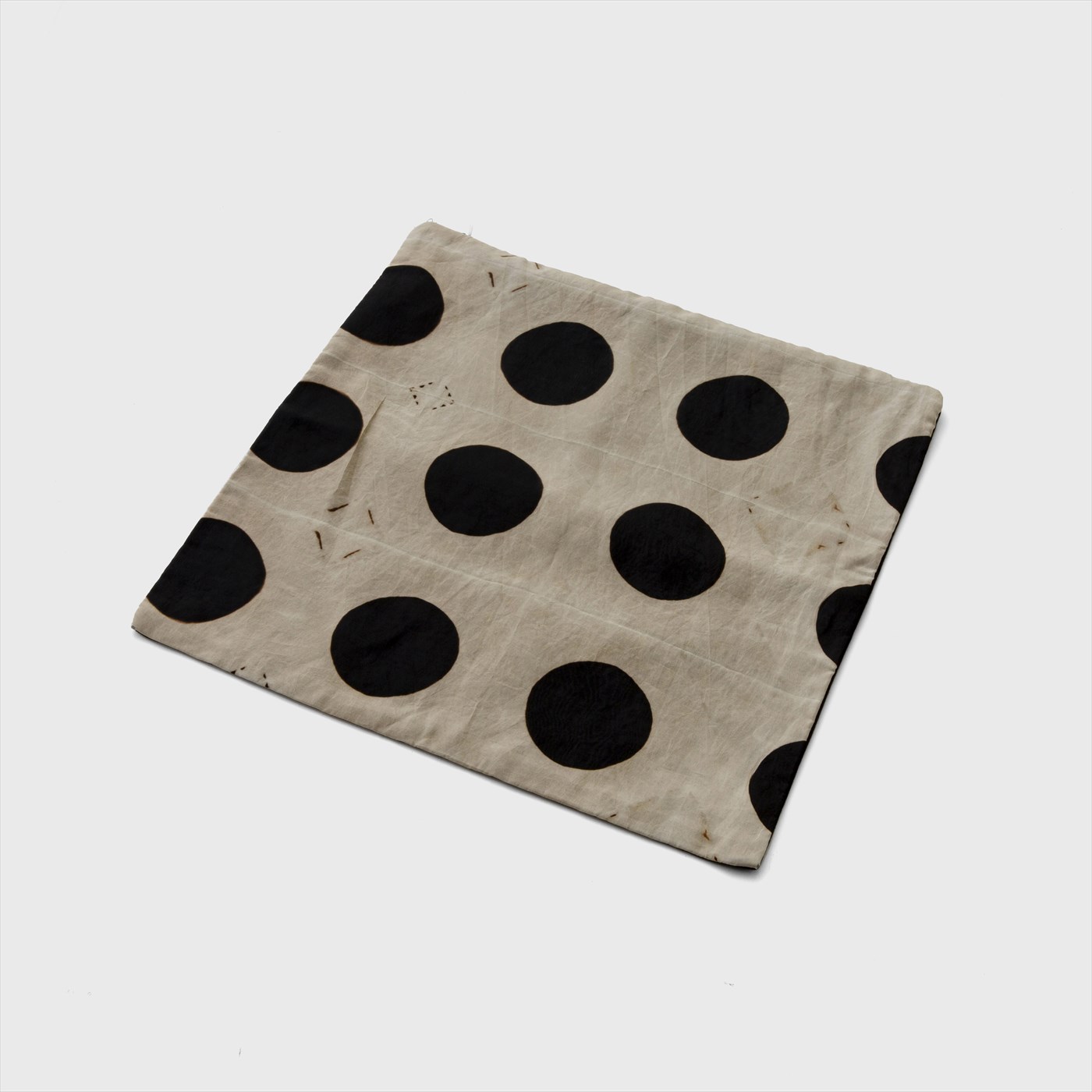 black dot pattern
cushion cover