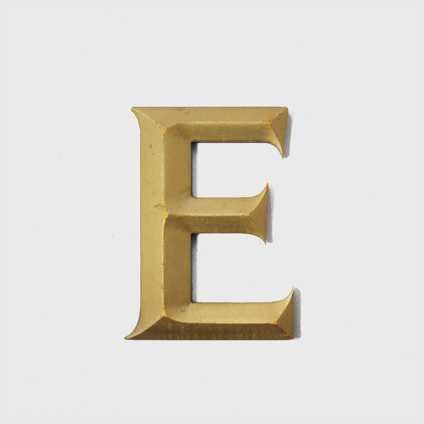 letter gold "E"